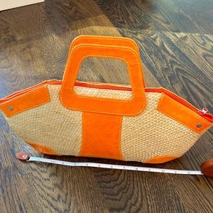 Summer straw woven purse used for 1 week! Lovely orange accent and unique